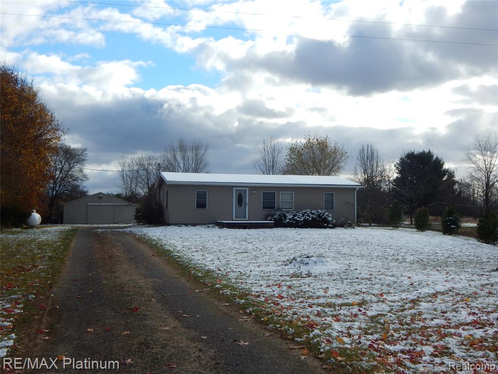 10321 E Lovejoy Road, Perry, MI 48872 — front exterior
