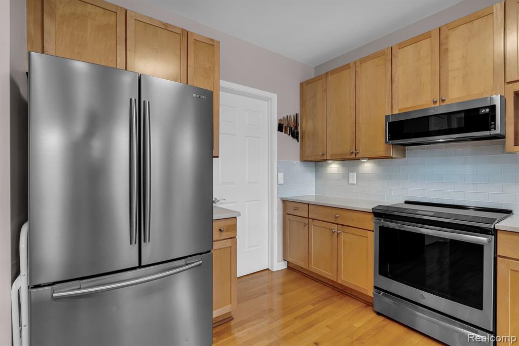620 FAIRWAYS Lane, Chelsea, MI 48118 — Photo 12