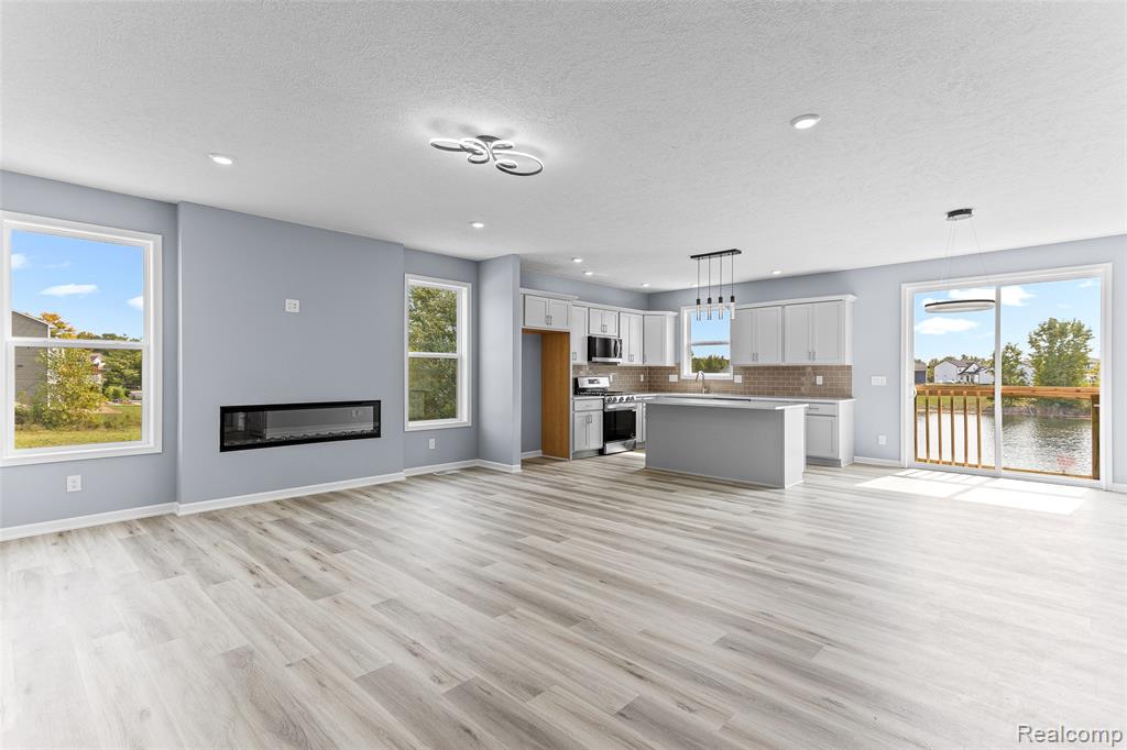 711 W Windward Way, Perry, MI 48872 — Photo 2