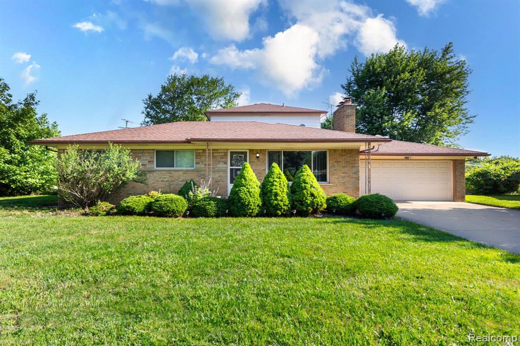 8345 E 14 Mile Road, Sterling Heights, MI 48312 — front exterior