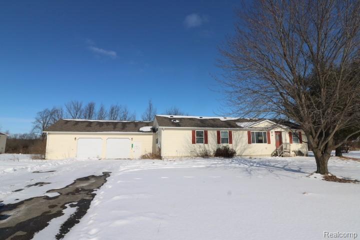 26 W Barnes Road, Fostoria, MI 48435 — front exterior