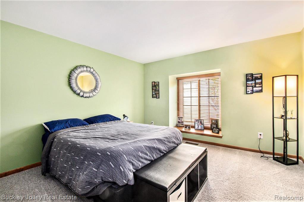 928 WOODRIDGE HILLS Drive, 83, Brighton, MI 48116 — Photo 11