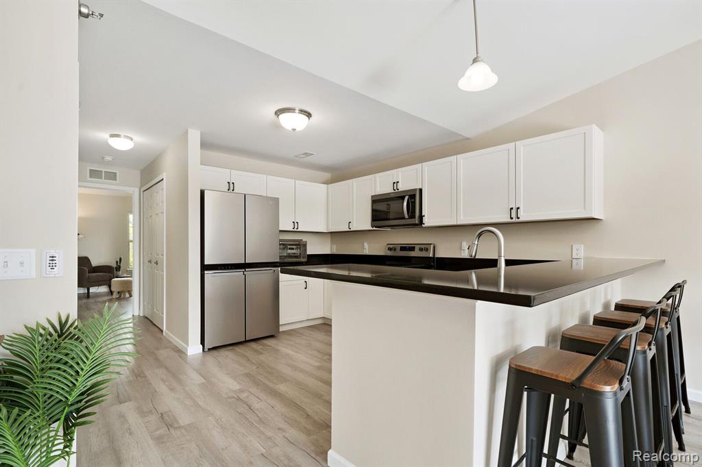 304 LEGATO Drive, Walled Lake, MI 48390 — Photo 11