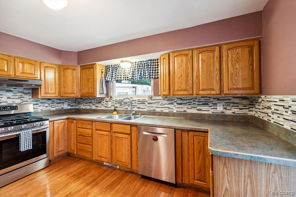 9849 WOODLAND Court, Ypsilanti, MI 48197 — Photo 14