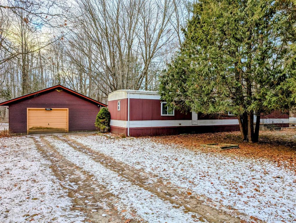 6669 WELCH Road, Port Austin, MI 48467 — front exterior