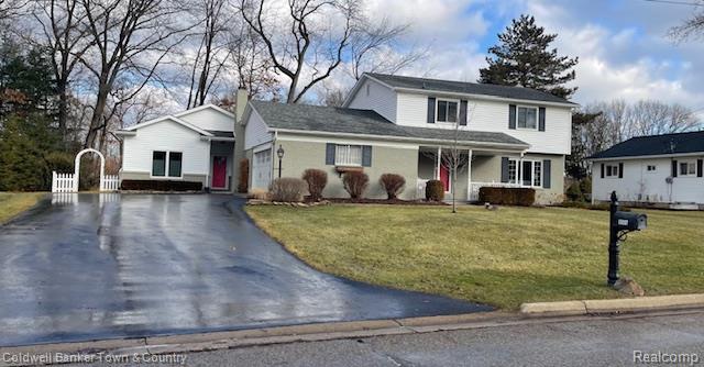 10557 Kenicott Trail, Brighton, MI 48114 — front exterior