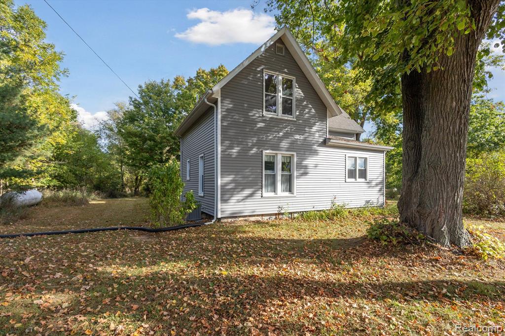 674 Beech Highway, MI 48813 — front exterior