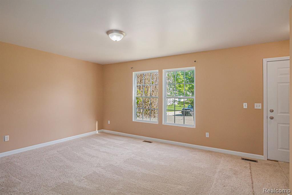 8608 RIFLE RIVER Drive, Fowlerville, MI 48836 — Photo 4