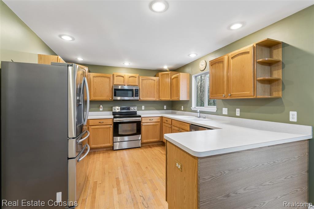 1520 NE Eden Gardens Drive S, Fenton, MI 48430 — Photo 8
