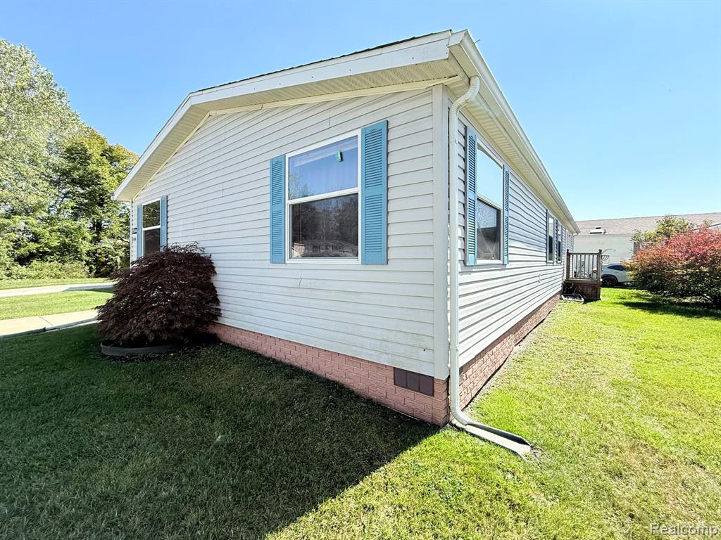 10846 Ashley Court, Willis, MI 48191 — front exterior