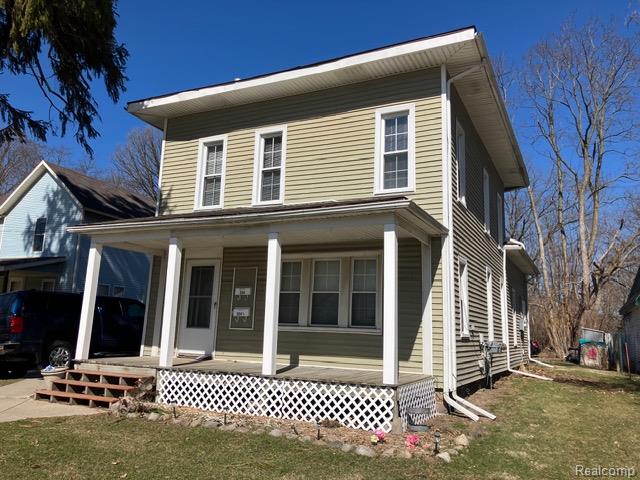 504 E Clinton Street, Howell, MI 48843 — front exterior