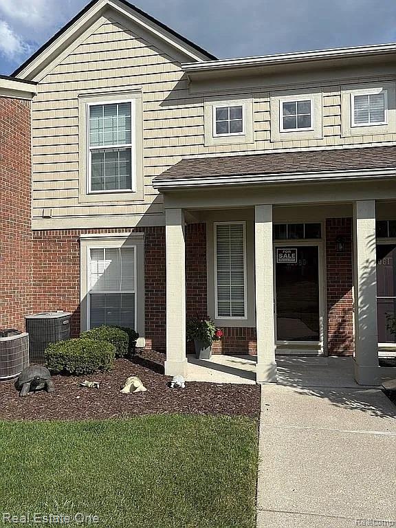 52069 Naugatuck Drive, 47, Macomb, MI 48042 — front exterior