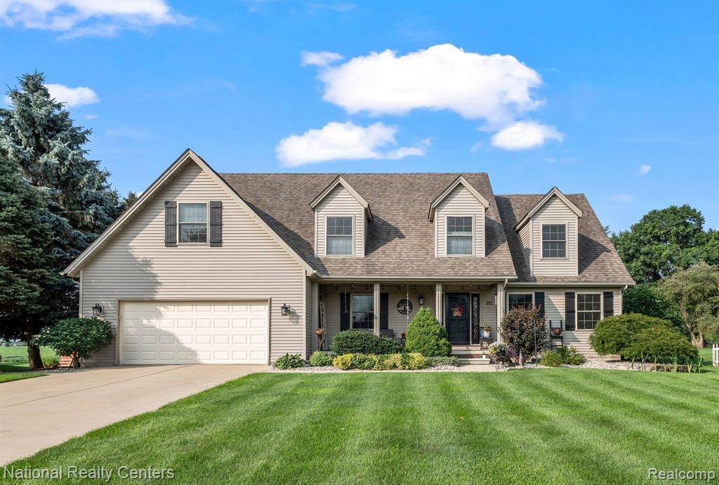 391 MCINTOSH, Almont, MI 48003 — front exterior