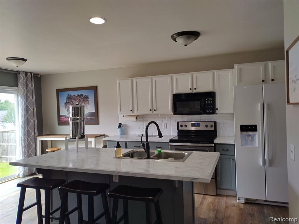 7484 WALNUT Drive, Goodrich Vlg, MI — Photo 28