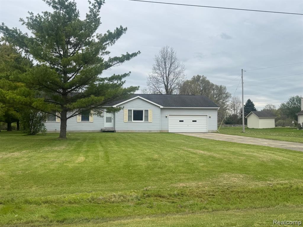 10056 Carlee June Drive, Fenton, MI 48430 — front exterior