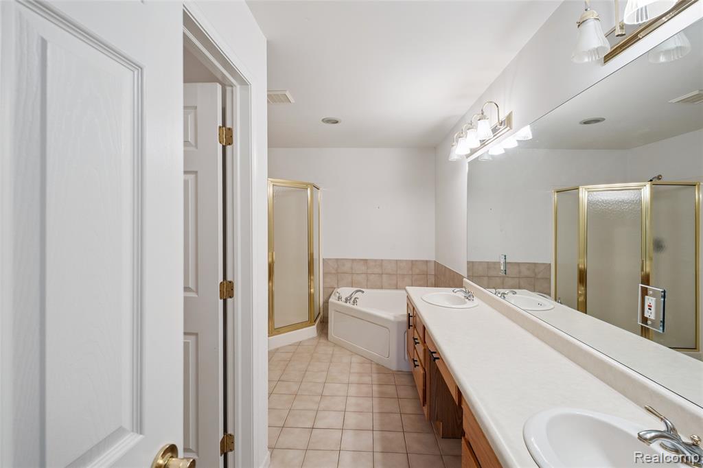 628 Olde Ivy Lane, Howell, MI 48843 — Photo 18
