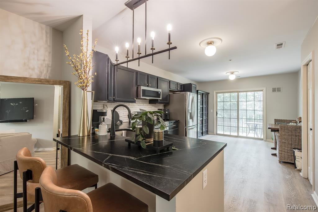 617 Village Lane, 58, Milford, MI 48381 — Photo 11