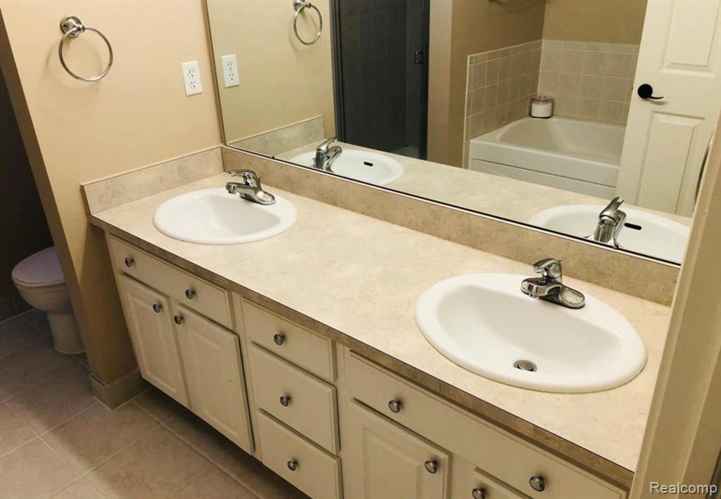 701 CHERRY ORCHARD Road, Canton, MI 48188 — Photo 11
