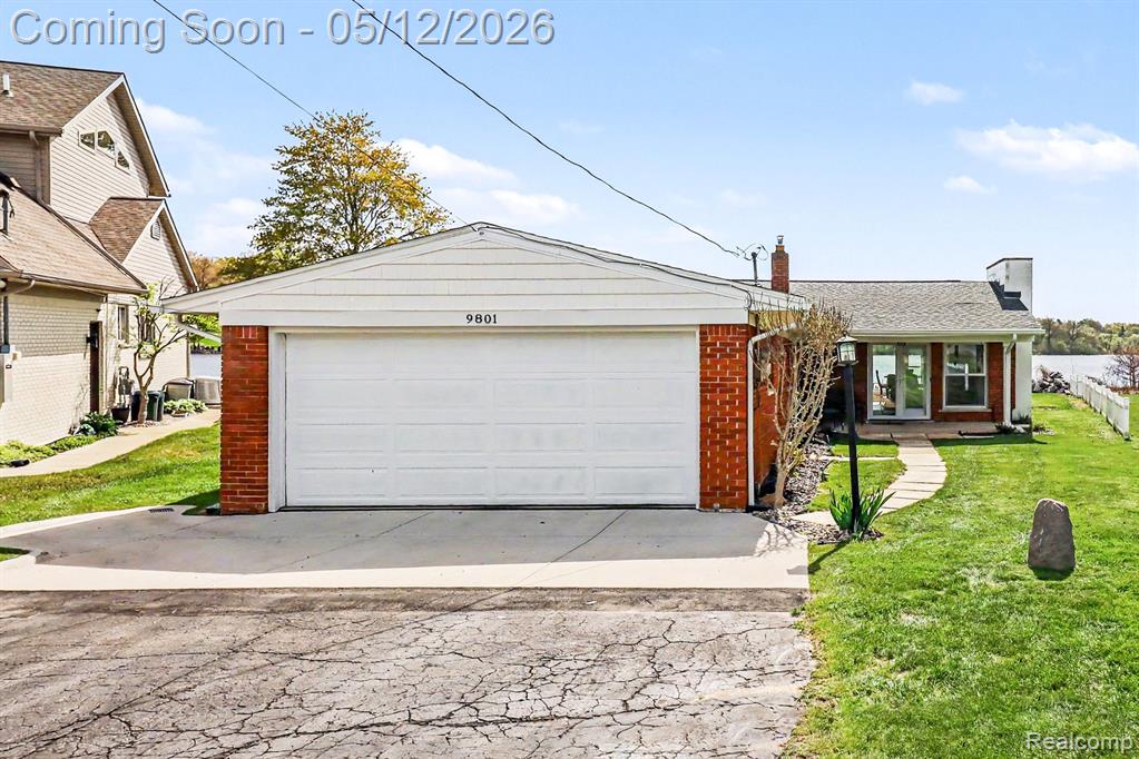 9801 Coledale Court, White Lake, MI — front exterior