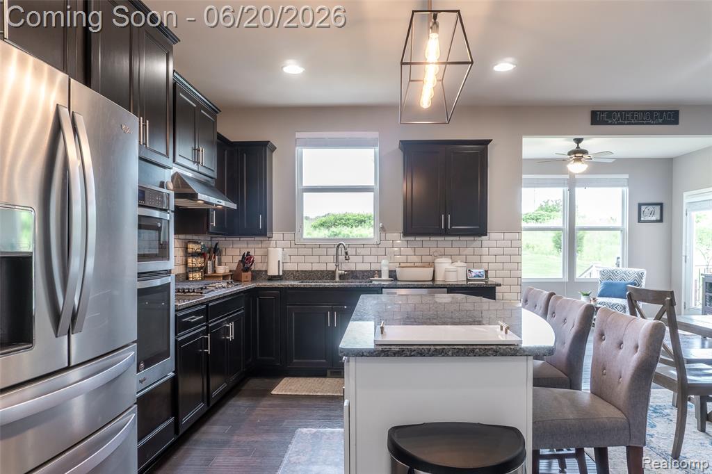57896 Cider Mill Drive, New Hudson, MI 48165 — Photo 23