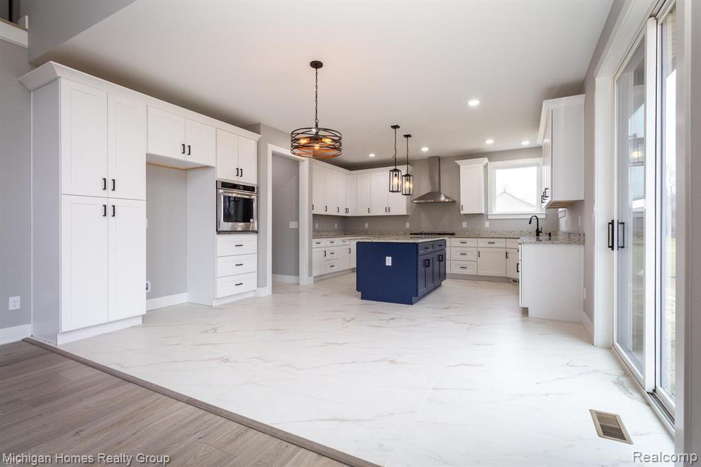 2910 LOON Drive, Wixom, MI 48393 — Photo 76