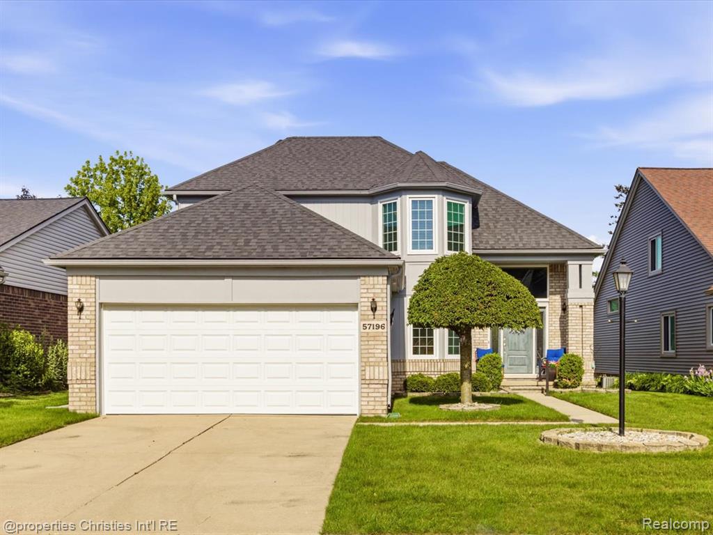 57196 Copper Creek Drive W, Washington, MI — front exterior