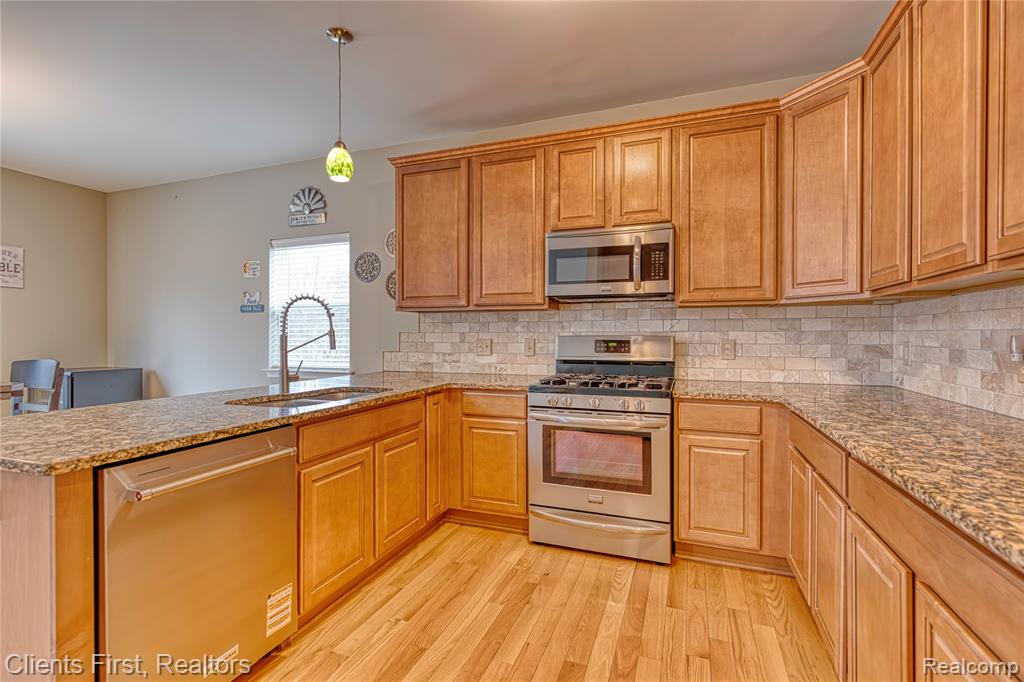 1291 Courtney Court, Hartland, MI 48353 — Photo 24