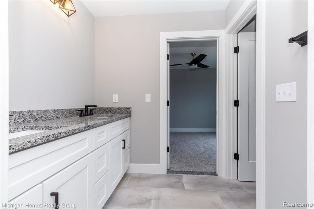 2910 LOON Drive, Wixom, MI 48393 — Photo 23