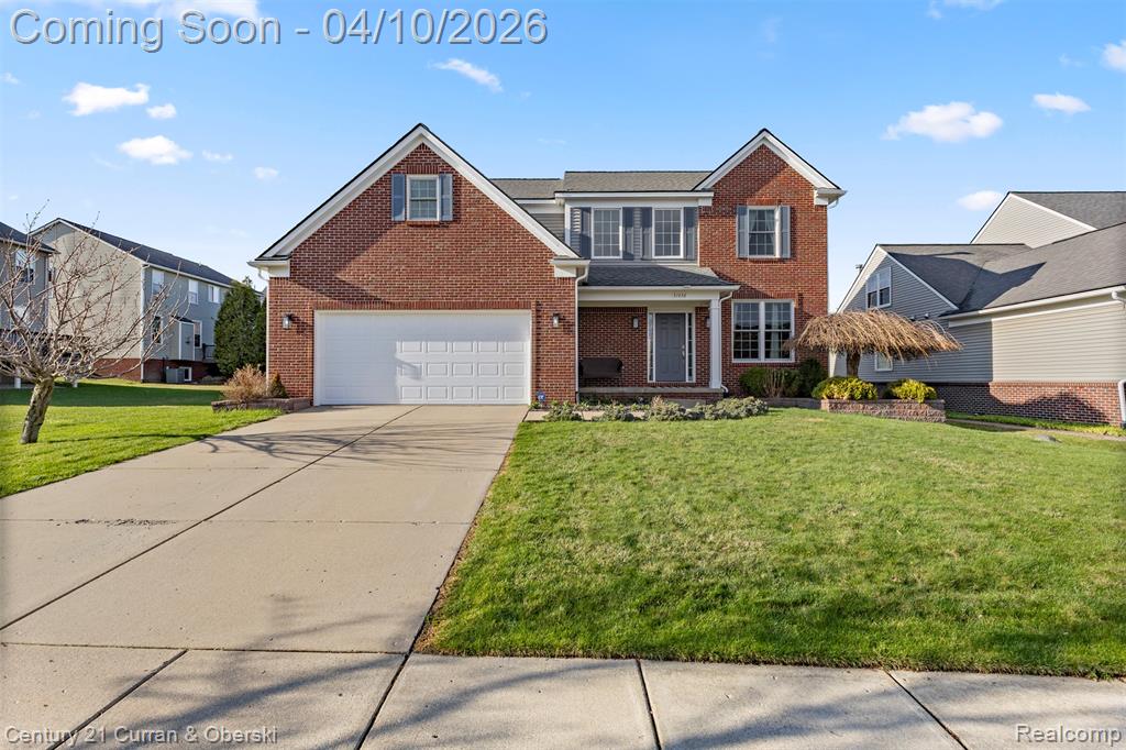 57858 Cider Mill Drive, New Hudson, MI 48165 — front exterior