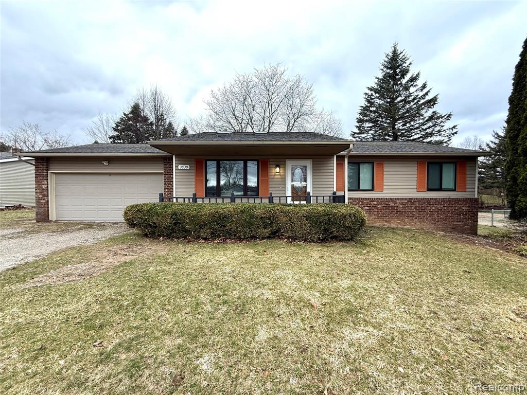 3639 Loch Drive, Highland, MI — front exterior