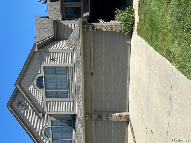 45125 Horseshoe Circle, 52, Canton, MI 48187 — front exterior