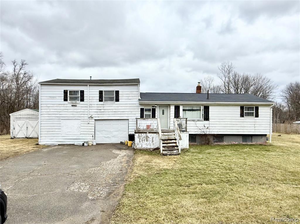 6377 E Atherton Road, Burton, MI 48519 — front exterior