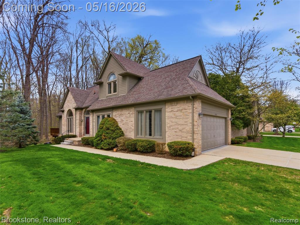 47318 Cider Mill Drive, Novi, MI — front exterior
