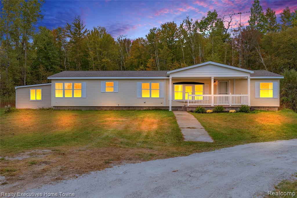 8067 Lambs Road, Wales, MI — front exterior
