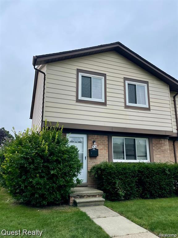 8401 18 MILE Road, Sterling Heights, MI 48313 — front exterior