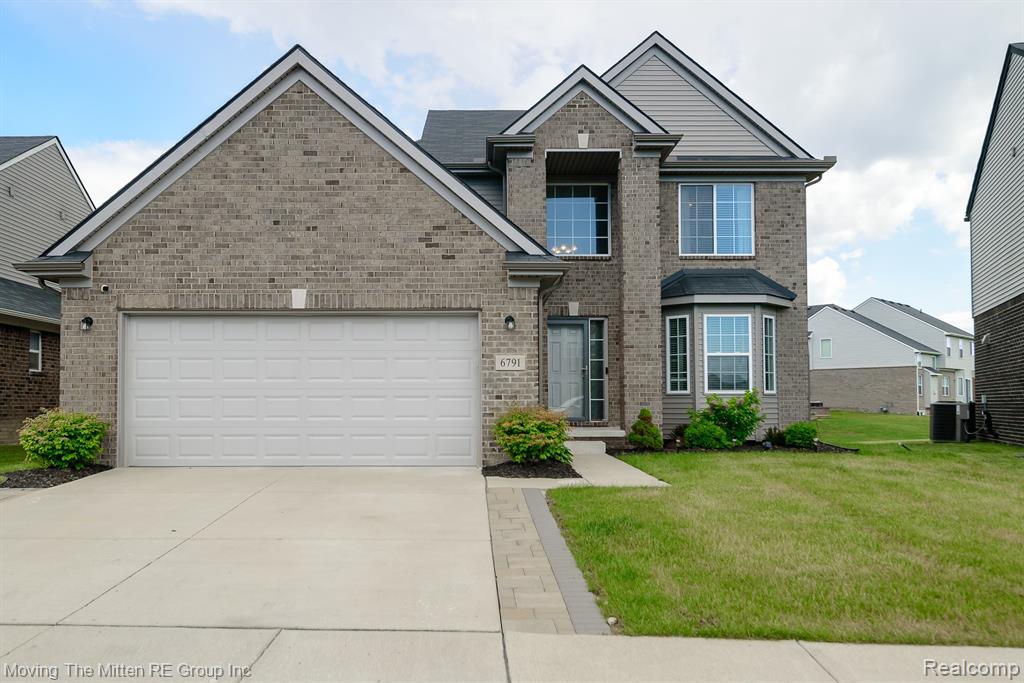 6791 Chandler Drive, Belleville, MI 48111 — front exterior