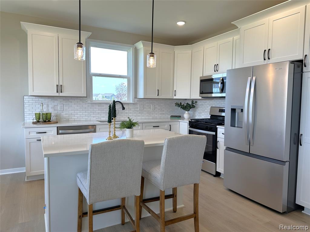 331 MCDOWELL DR, Howell, MI 48843 — Photo 7