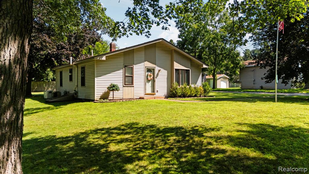 971 Tierney, Highland, MI 48356 — front exterior