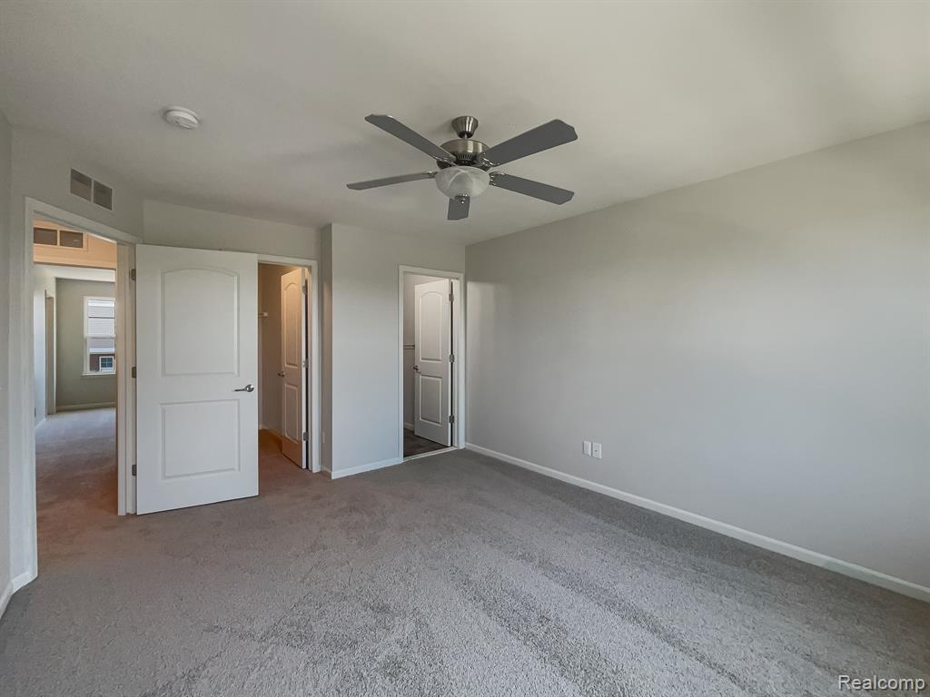242 CENTER Boulevard, Wixom, MI 48393 — Photo 11