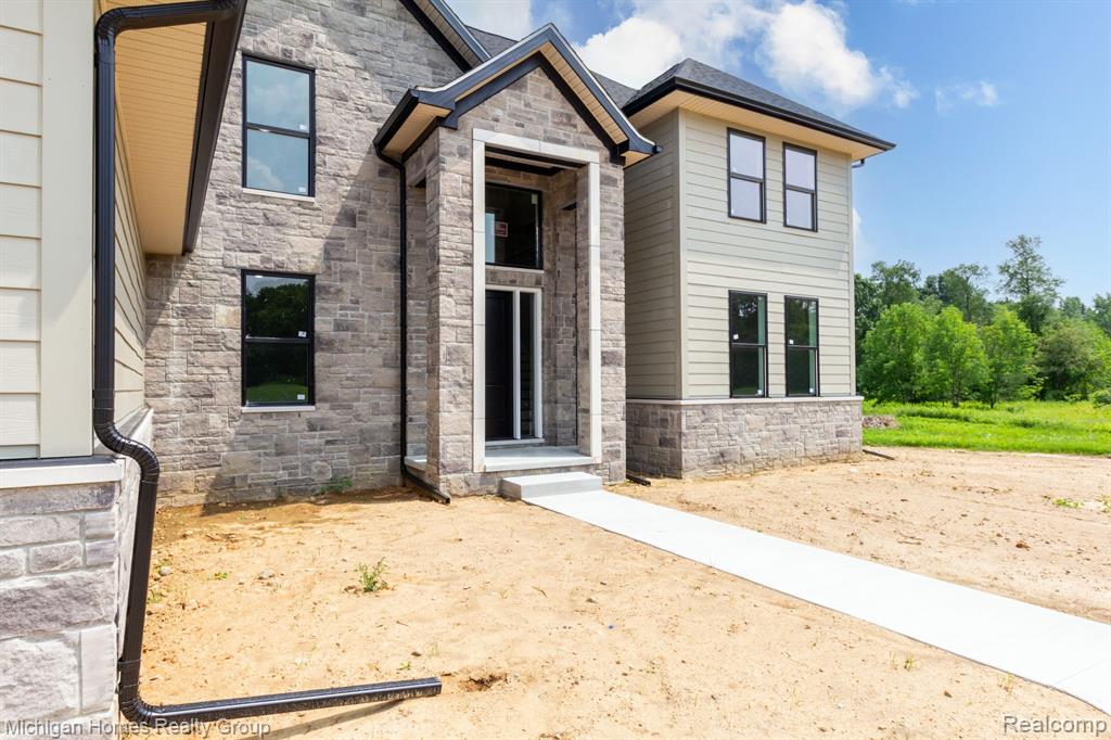 2910 LOON Drive, Wixom, MI 48393 — Photo 21