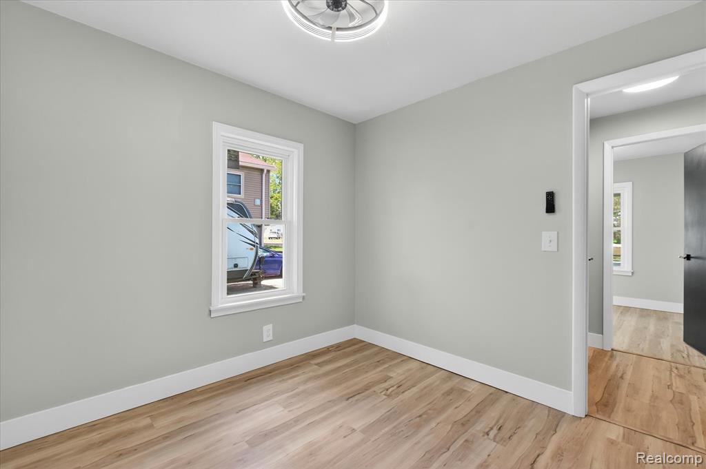 677 Lucille Drive, Wolverine Lake, MI 48390 — Photo 28