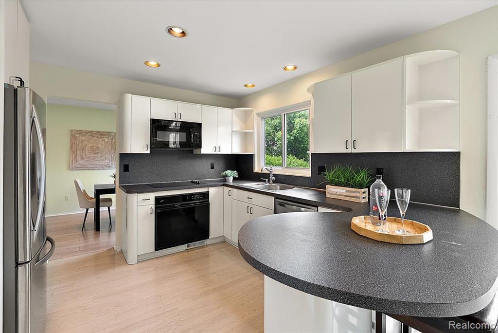 2832 Warrior Drive, Wixom, MI 48393 — Photo 18