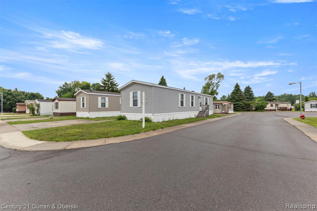76 Fawn Lake Drive, Walled Lake, MI 48390 — front exterior