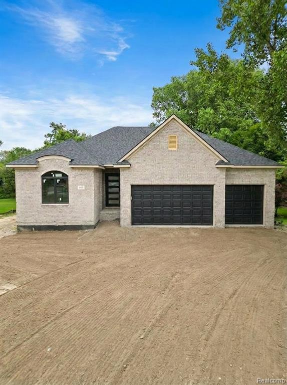 933 N Wixom Road, Wixom, MI 48393 — front exterior