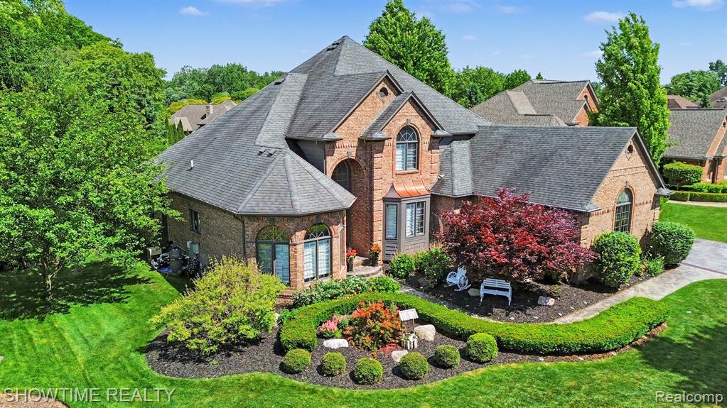 54676 Woodcreek Boulevard, Utica, MI 48315 — front exterior