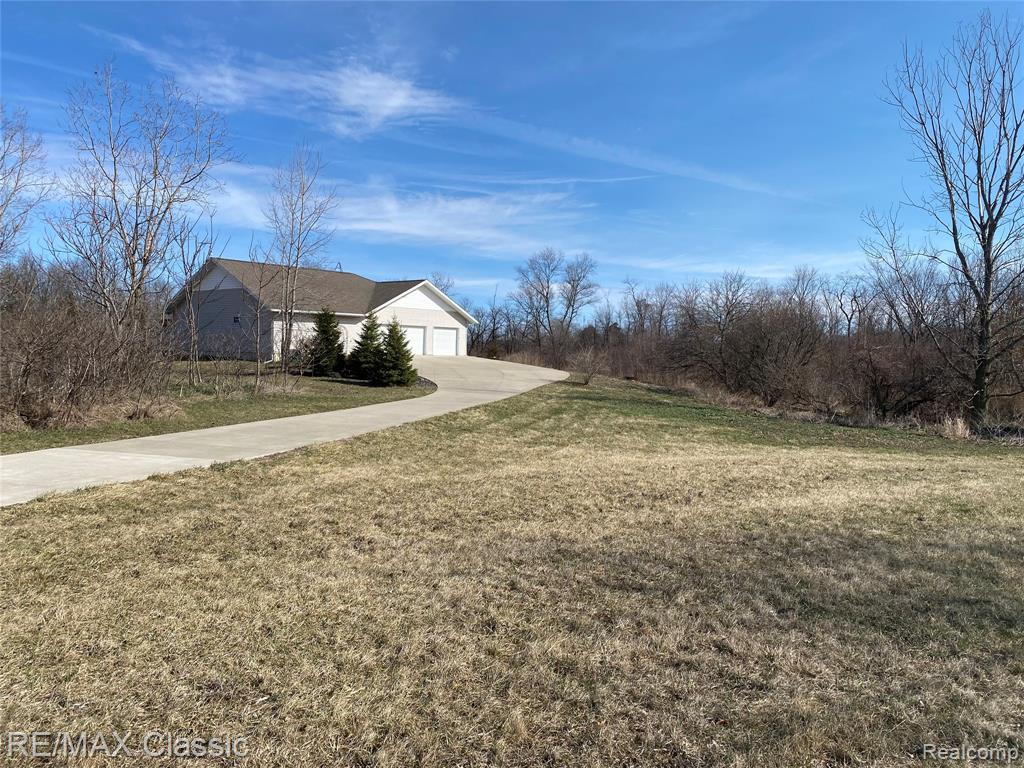1577 Benner Highway, Clayton, MI 49235 — front exterior
