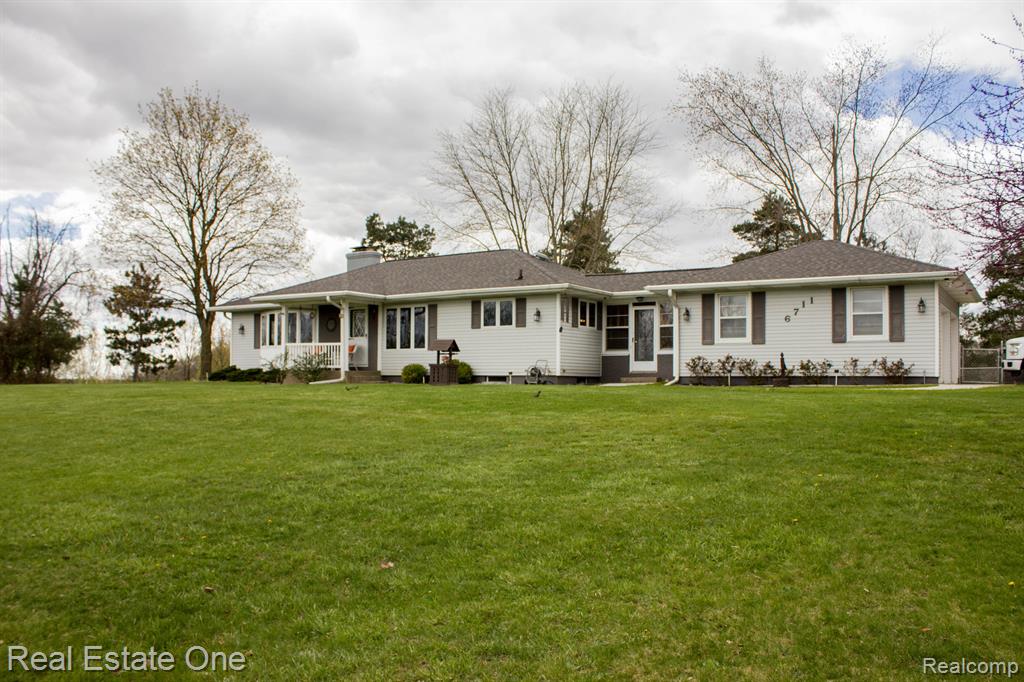 6711 KUTTSHILL Drive NE, Rockford, MI 49341 — front exterior