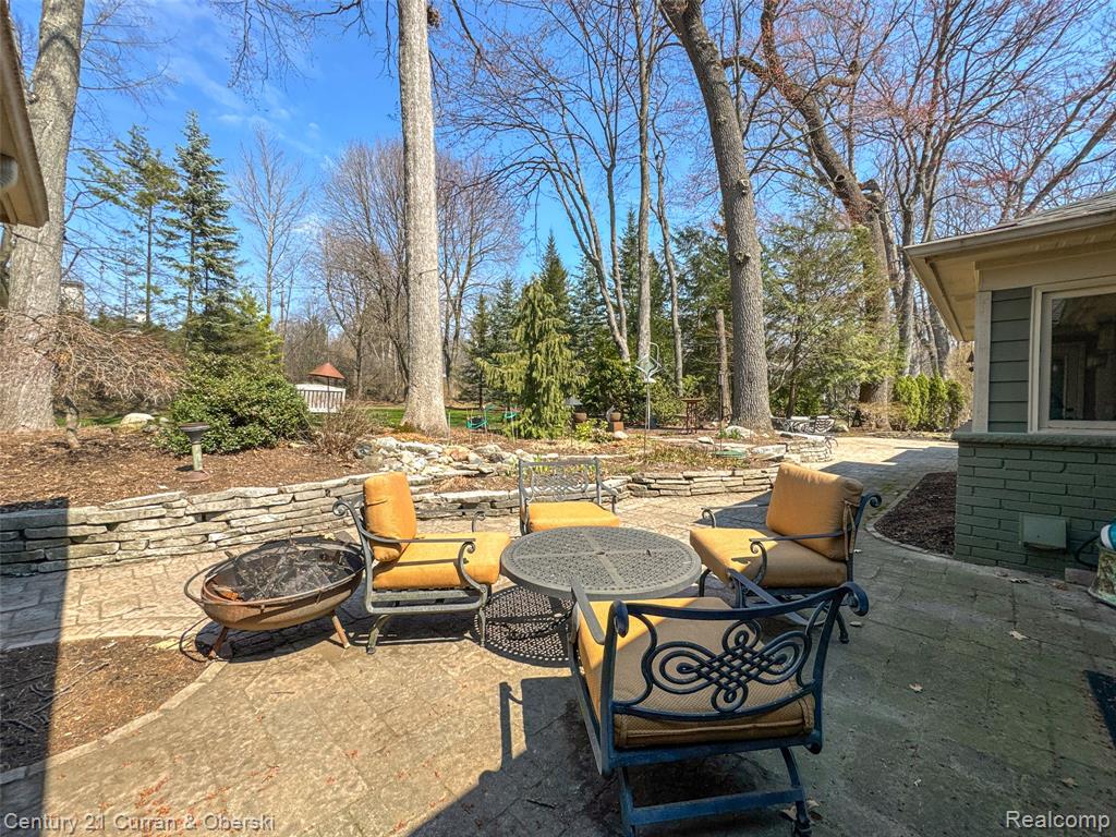 View of patio / terrace with a fire pit