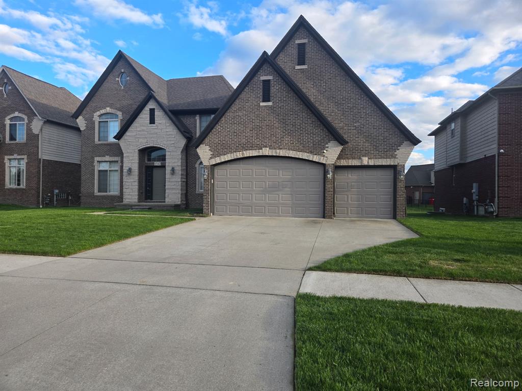 15342 Amberfield Drive, Macomb, MI 48042 — front exterior