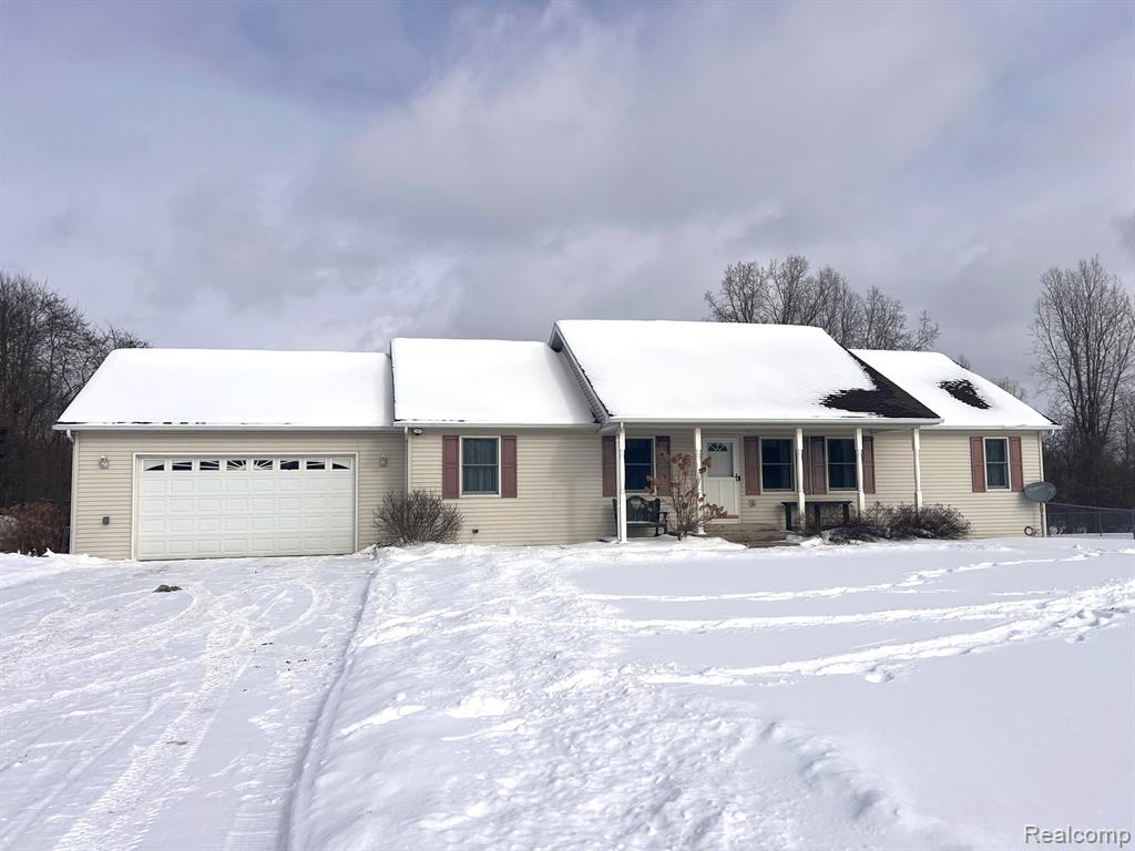 651 Beard Road, Perry, MI 48872 — front exterior